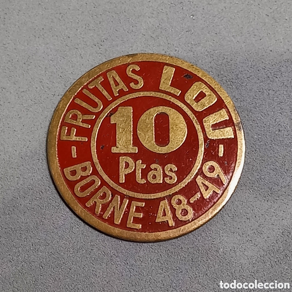 Monedas locales: Antigua ficha dineraria, Frutas Lou, mercado del Borne - Barcelona (Born), 10 pesetas. Lat&oacute;n.