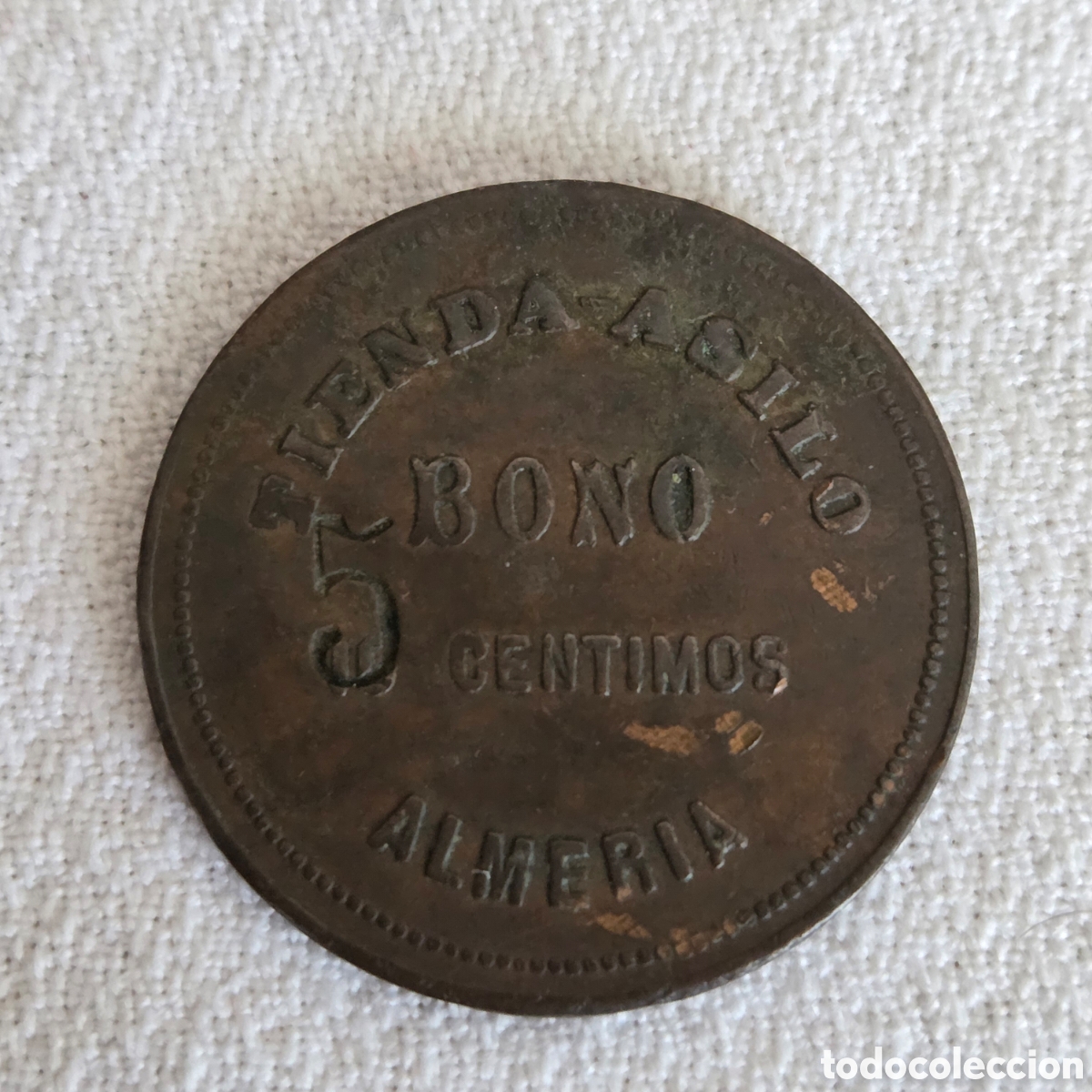 Monedas locales: Ficha Tienda Asilo Almer&iacute;a 1886 - Bono 5 C&eacute;ntimos (Iniciativa D.S. Moret) - MBC+ Rara