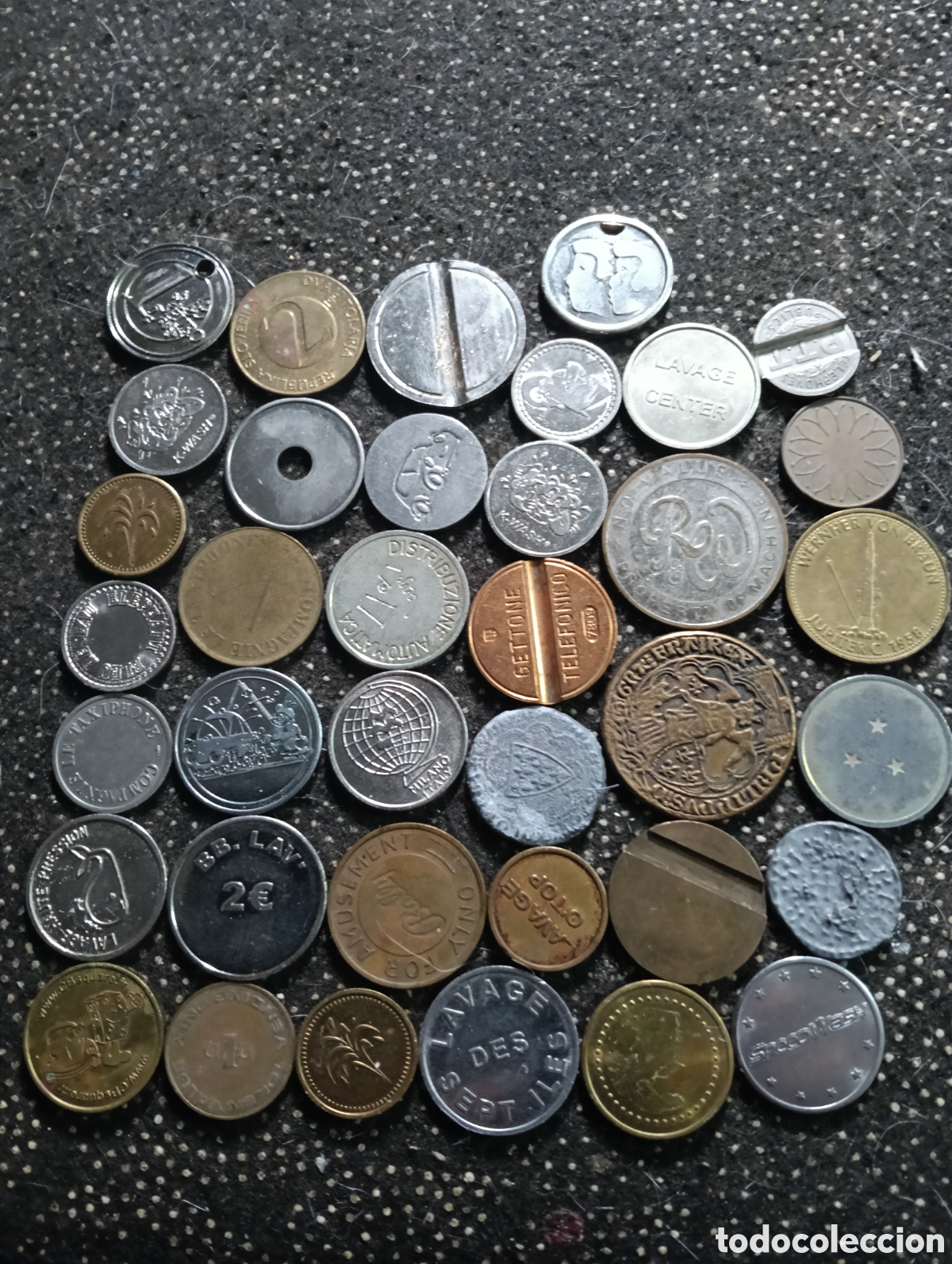 Monedas locales: Lote de 37 Jetones o tokens todos diferentes y de varias industrias.