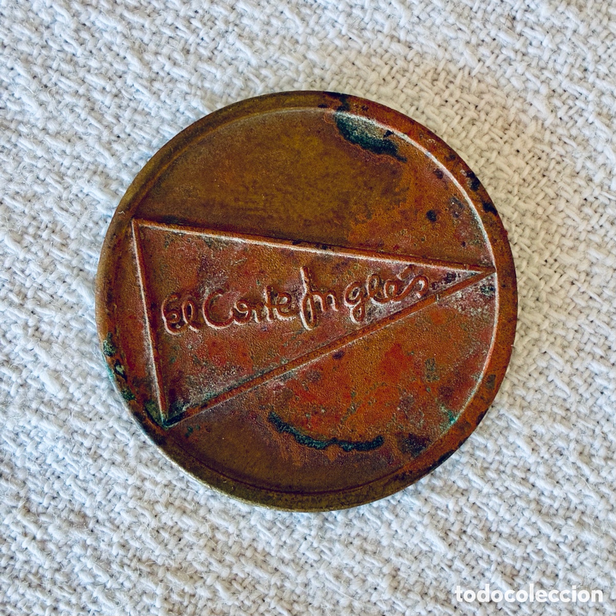 Moedas locais: Antigua ficha de bronce aparcamiento El Corte Ingl&eacute;s