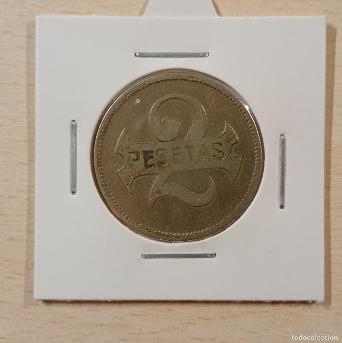 Monete locali: FICHA CASINO O COOPERATIVA, 2 PESETAS, con F G EN REVERSO.