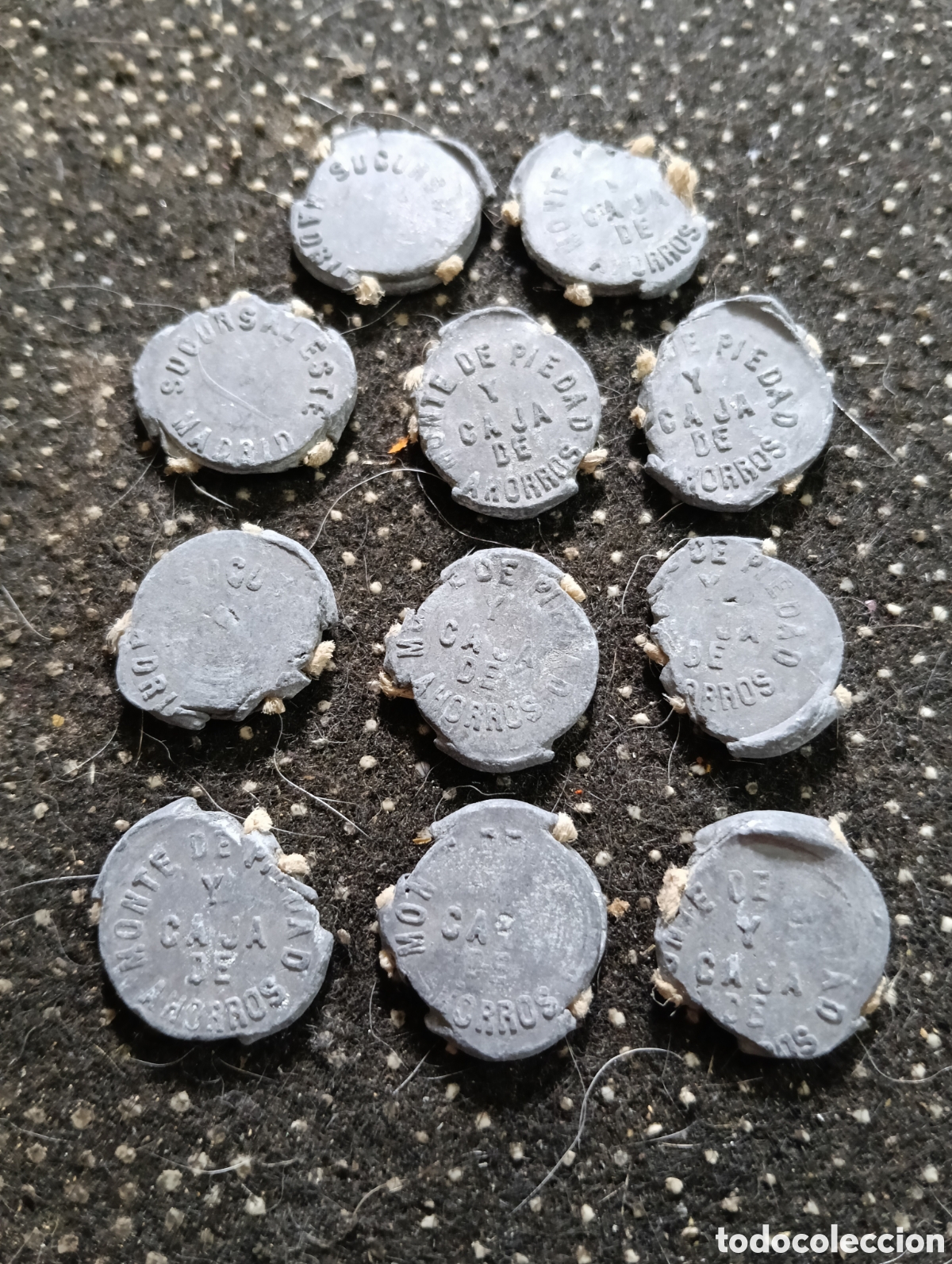 Monedas locales: Lote de 10 marchamos o plomos de precinto del Monte de Piedad y Caja de Ahorros de Sevilla, Madrid,