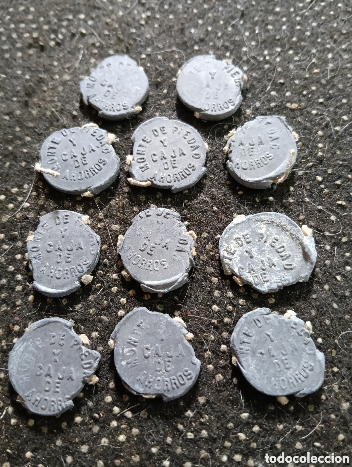 Monedas locales: Lote de 10 marchamos o plomos de precinto del Monte de Piedad y Caja de Ahorros de Sevilla, Madrid,