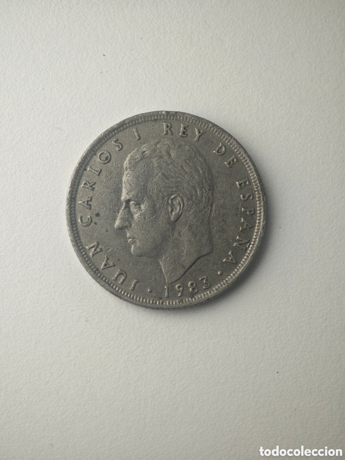 Monnaies m&eacute;di&eacute;vales: moneda espa&ntilde;ola de 25 pesetas del a&ntilde;o 1983 con la efigie del rey Juan Carlos I.