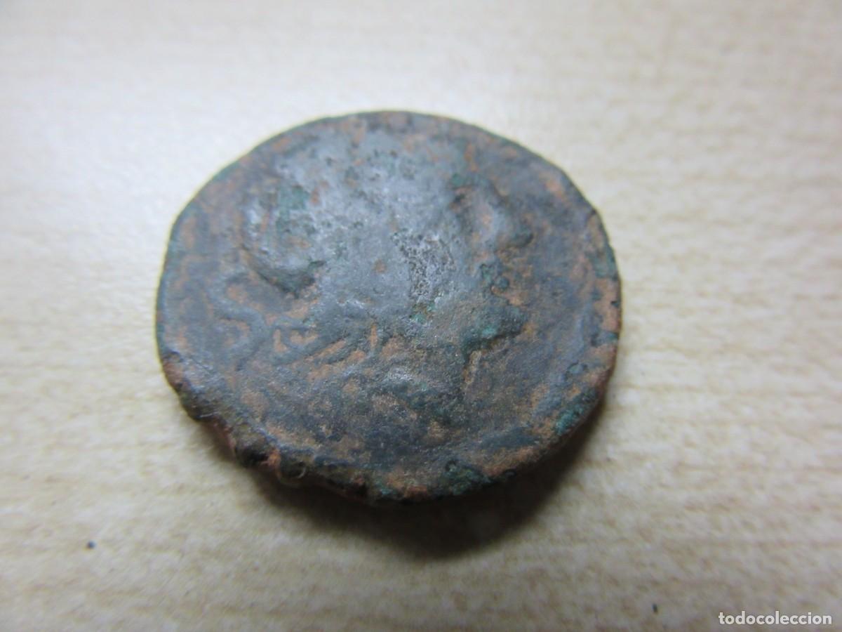 Monedas Roma Rep&uacute;blica: Semis republicano Di&aacute;metro 2,3 cm Peso 6,9 gr Anverso Cabeza de Saturno