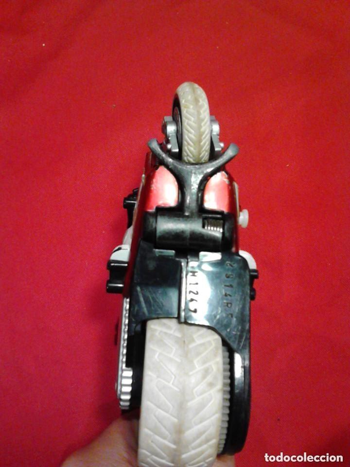 Motos a escala: moto de inercia marca k5500 - Foto 7