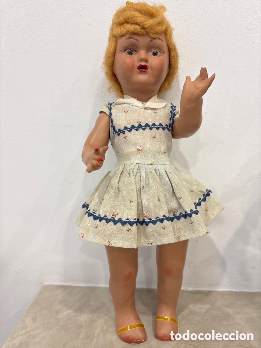 Mu&ntilde;eca espa&ntilde;ola clasica: Antigua mu&ntilde;eca de Onil, a&ntilde;os 50, realizada en cart&oacute;n piedra. Buen estado de conservaci&oacute;n. Mide 35 c