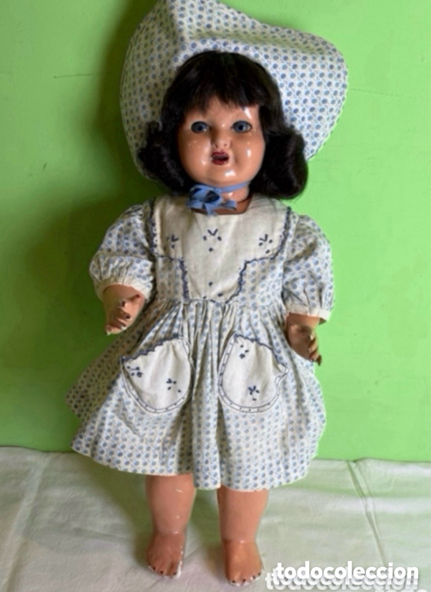 Mu&ntilde;eca Mariquita P&eacute;rez y juanin: Antigua mu&ntilde;eca de cart&oacute;n piedra tipo mariquita P&eacute;rez o similar a&ntilde;os 50. Mide 60 cm de alto.