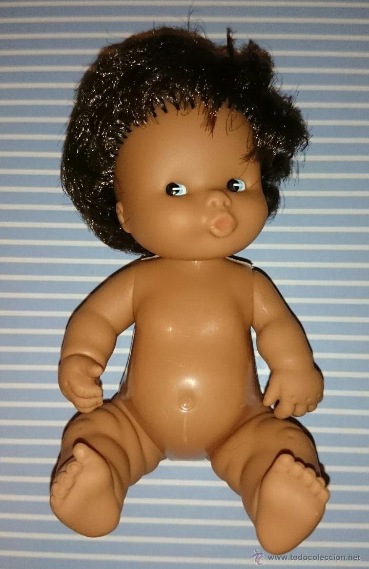 muñeca barriguita negra