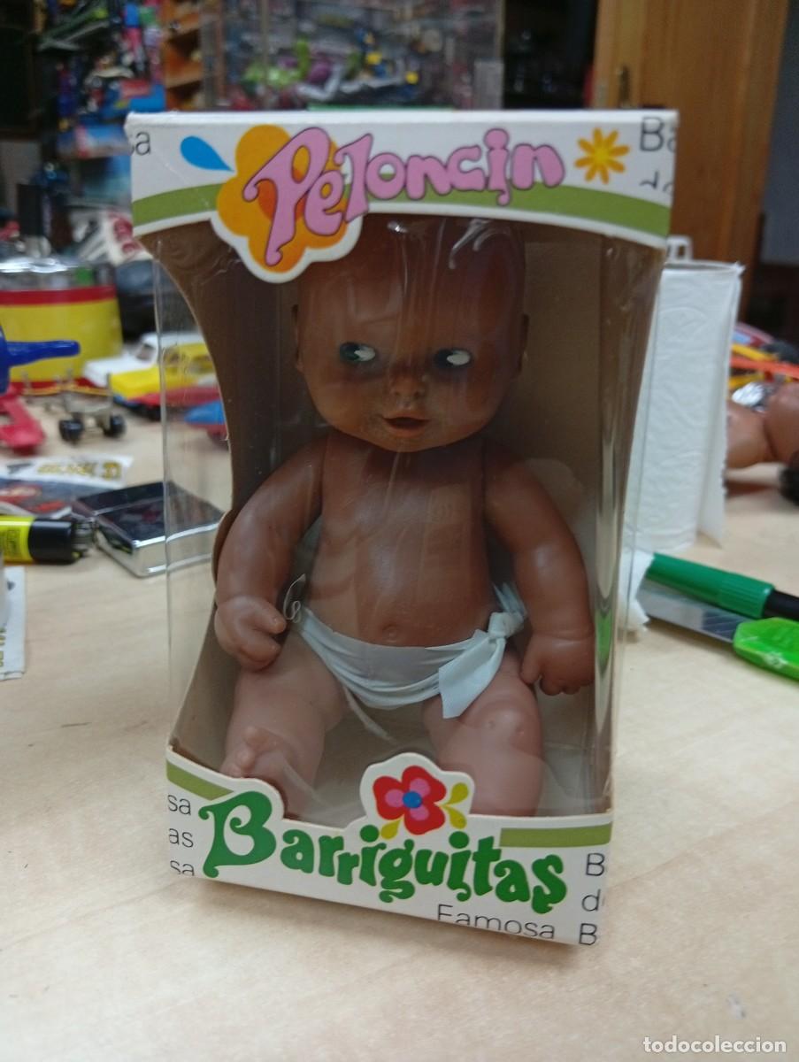 Mu&ntilde;ecas Lesly y Barriguitas: Barriguitas Peloncin de Famosa con caja.
