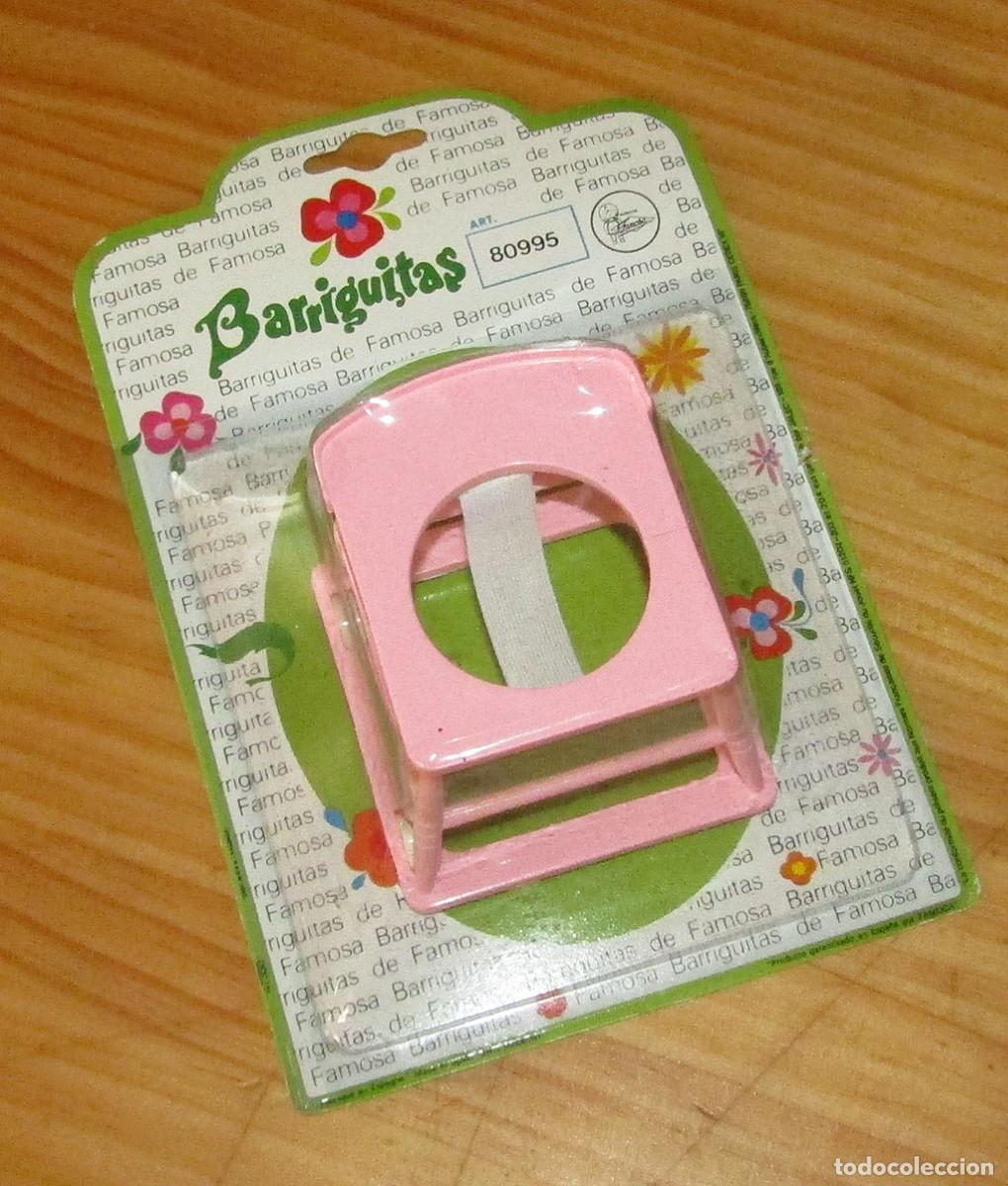 Mu&ntilde;ecas Lesly y Barriguitas: ANTIGUO TACA TAC O ANDADOR DE LAS BARRIGUITAS DE FAMOSA - NUEVO Y EN SU BLISTER - A&Ntilde;OS 70 - NUEVO