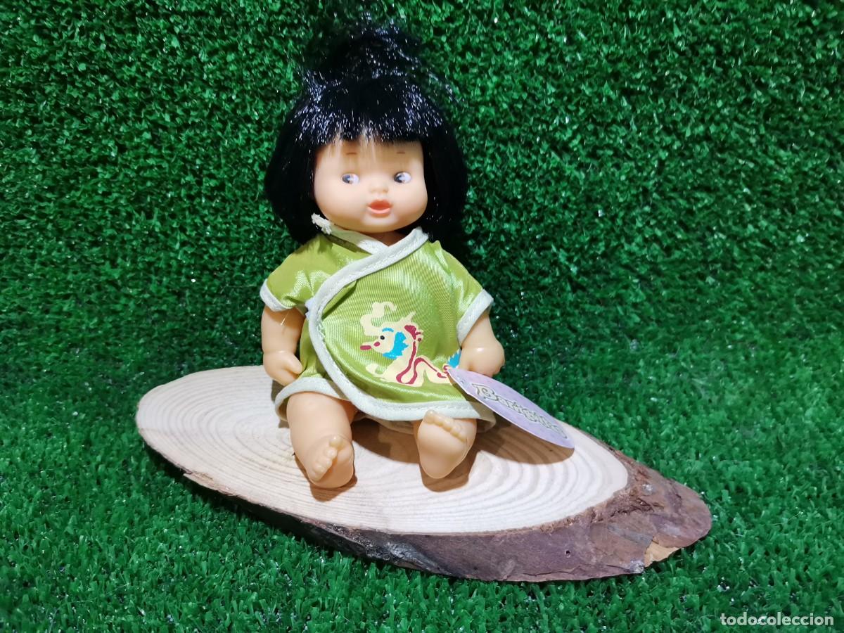 Mu&ntilde;ecas Lesly y Barriguitas: mu&ntilde;eca barriguitas morena con traje verde