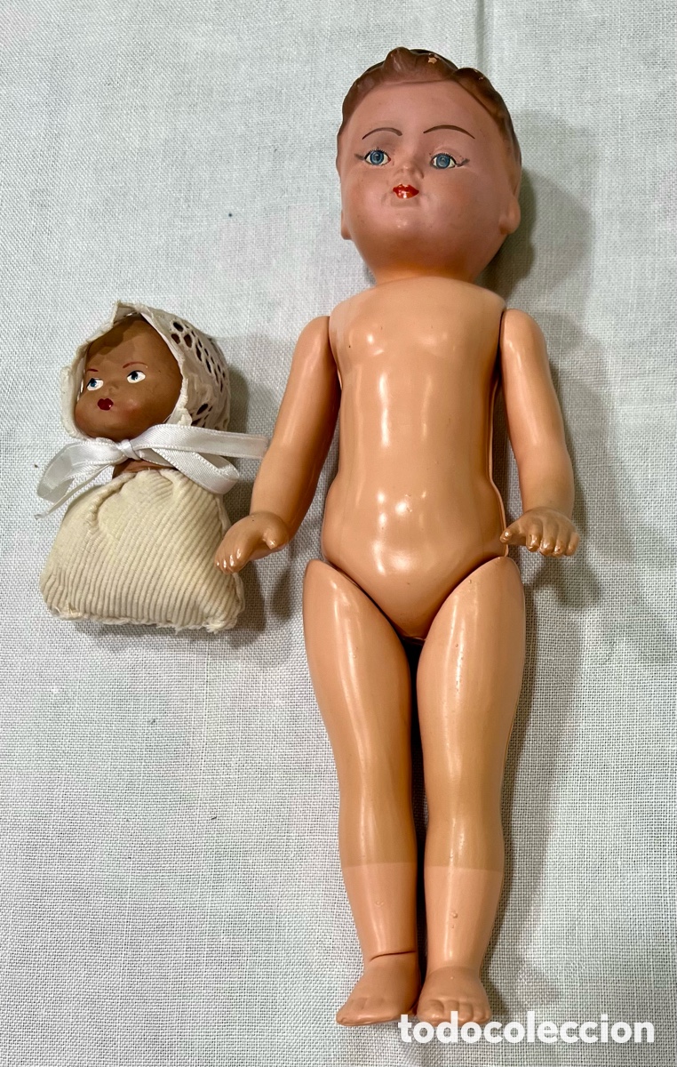 Mu&ntilde;ecas celuloide: Mu&ntilde;eco antiguo de celuloide y cabeza de beb&eacute; de terracota. - Foto 2