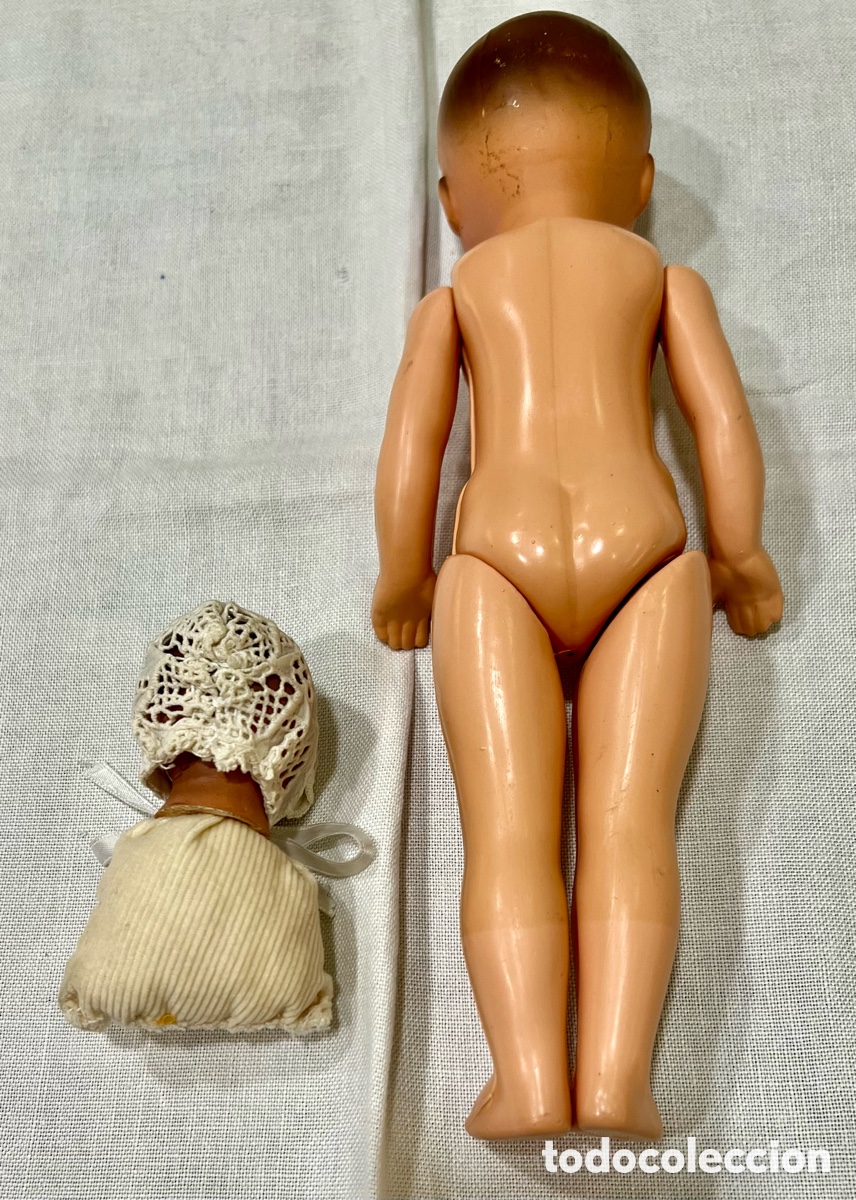 Mu&ntilde;ecas celuloide: Mu&ntilde;eco antiguo de celuloide y cabeza de beb&eacute; de terracota. - Foto 3