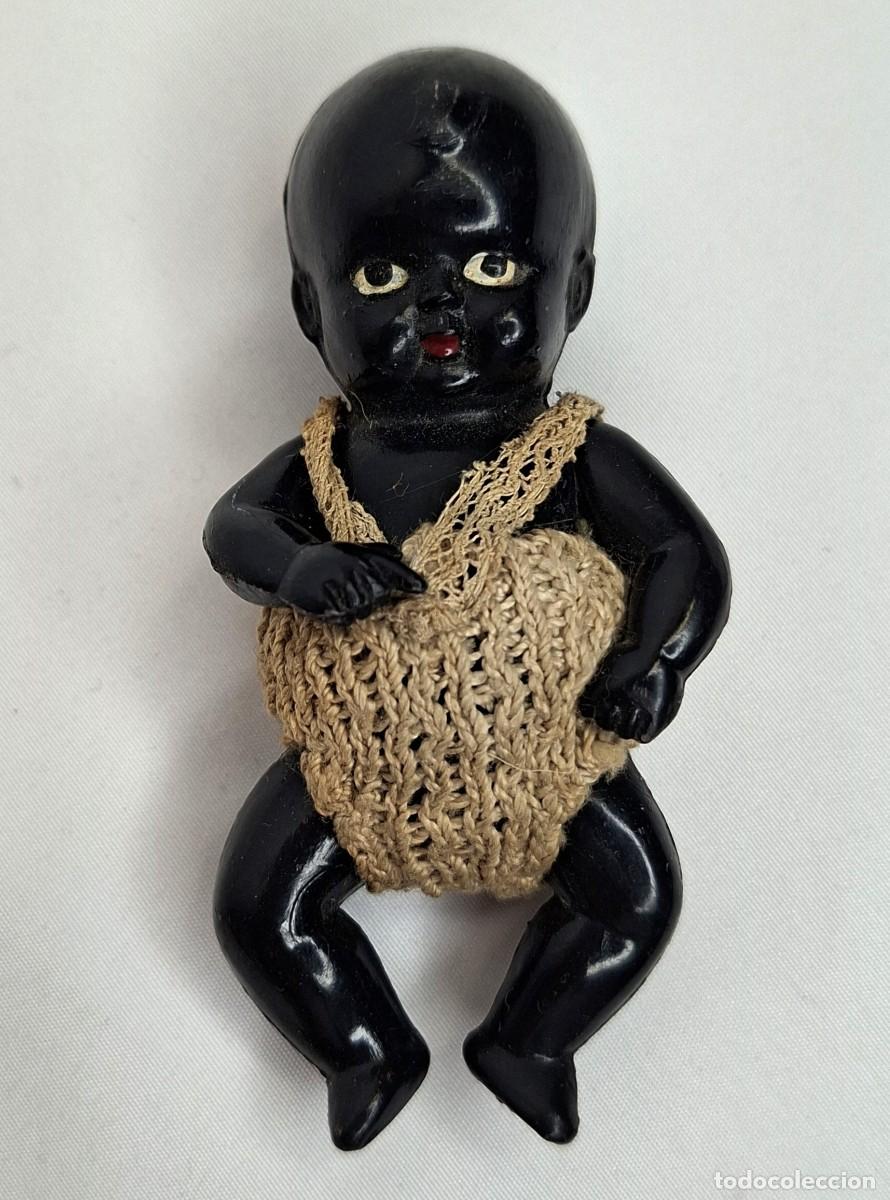 Mu&ntilde;ecas celuloide: MU&Ntilde;ECO BEBE DE CELULOIDE NEGRO, MIDE 8cm.