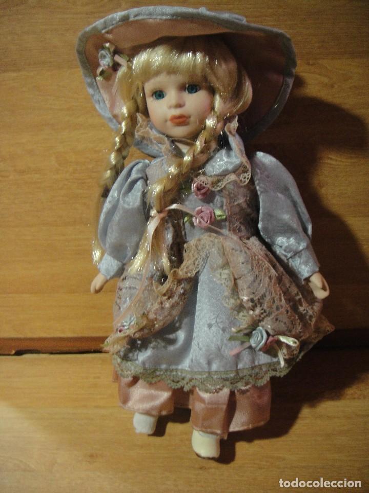 Mu&ntilde;ecas espa&ntilde;olas modernas: mu&ntilde;eca con cabeza de porcelana - Foto 1