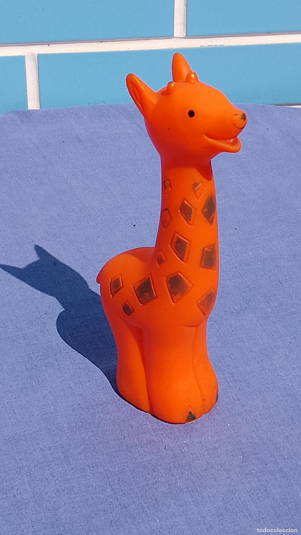 Mu&ntilde;ecas Espa&ntilde;olas Modernas: Antiguo mu&ntilde;eco de goma Jirafa naranja