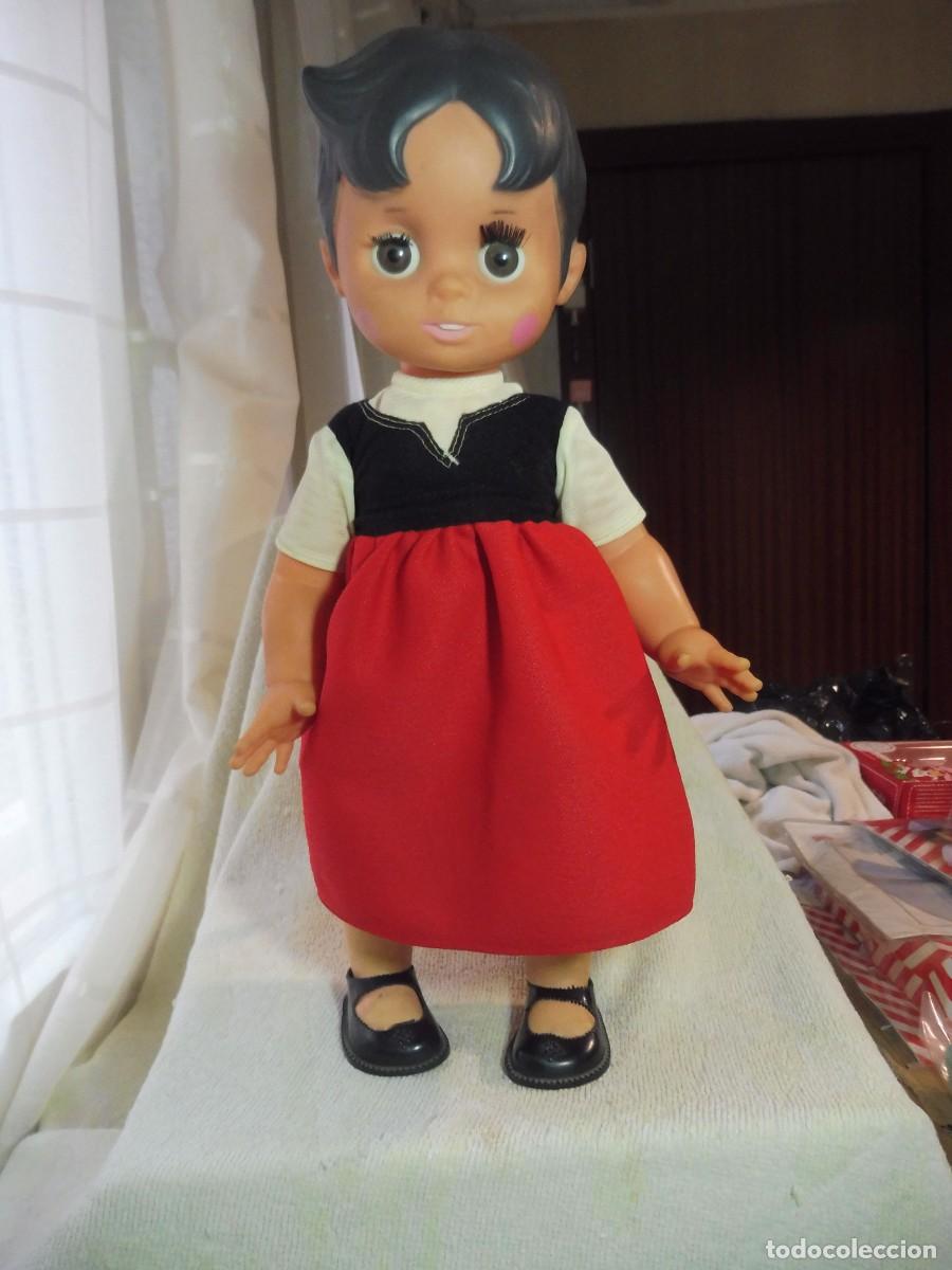 Mu&ntilde;ecas Espa&ntilde;olas Modernas: Mu&ntilde;eca Heidi sin marca con pelo de goma y ojos fijos