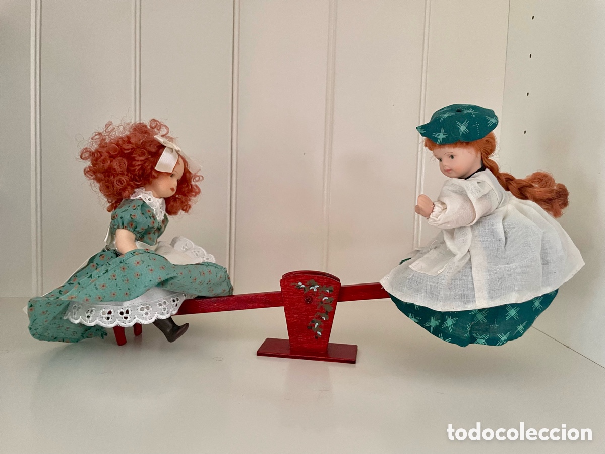 Mu&ntilde;ecas espa&ntilde;olas modernas: Mu&ntilde;ecas de porcelana con su balanc&iacute;n