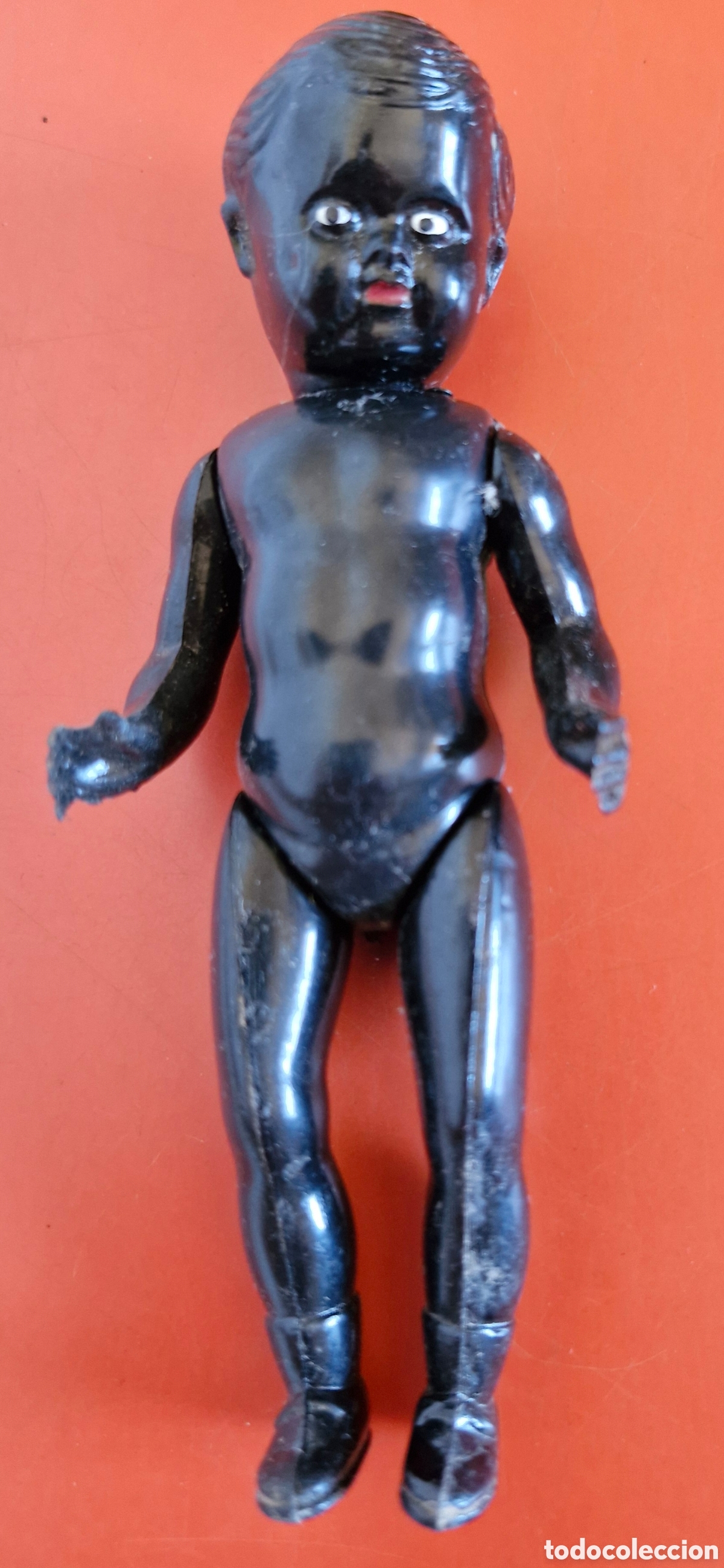 Mu&ntilde;ecas espa&ntilde;olas modernas: MU&Ntilde;ECO NEGRO ARTICULADO DE CELULOIDE.NACIONAL 60'S.NUEVO.
