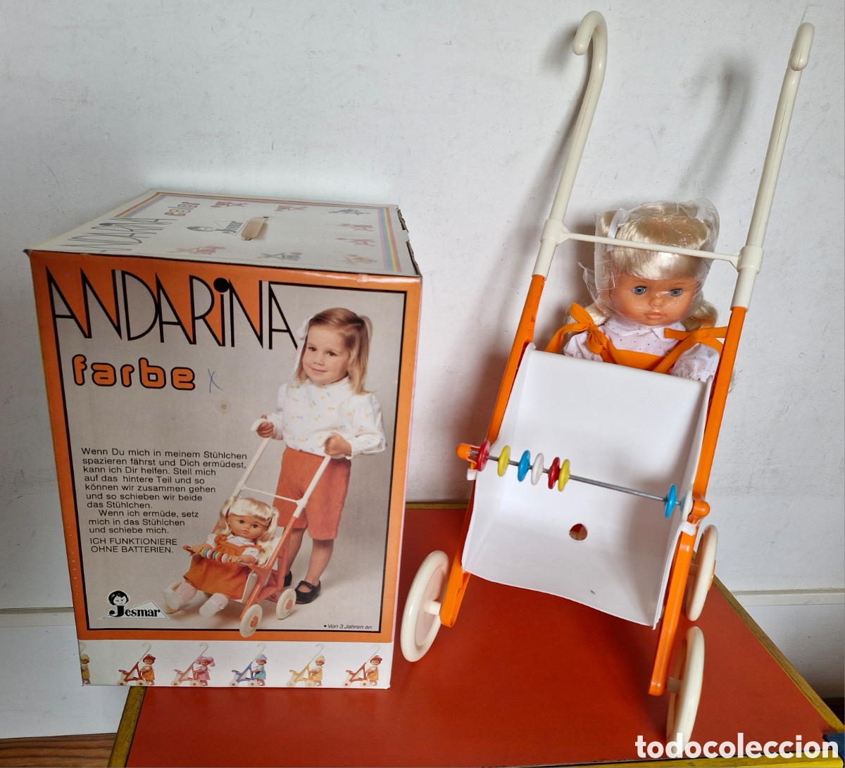 Mu&ntilde;ecas espa&ntilde;olas modernas: MU&Ntilde;ECA ANDARINA COLOR NARANJA CON SILLA PASEO.JESMAR 80'S.NUEVA EN CAJA.