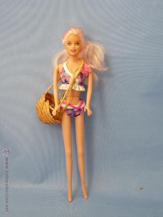 Mu&ntilde;ecas modernas: MU&Ntilde;ECA PLAYERA CON BOLSO. GASTOS DE ENVIO 5&euro; CERTIFICADO - Foto 1