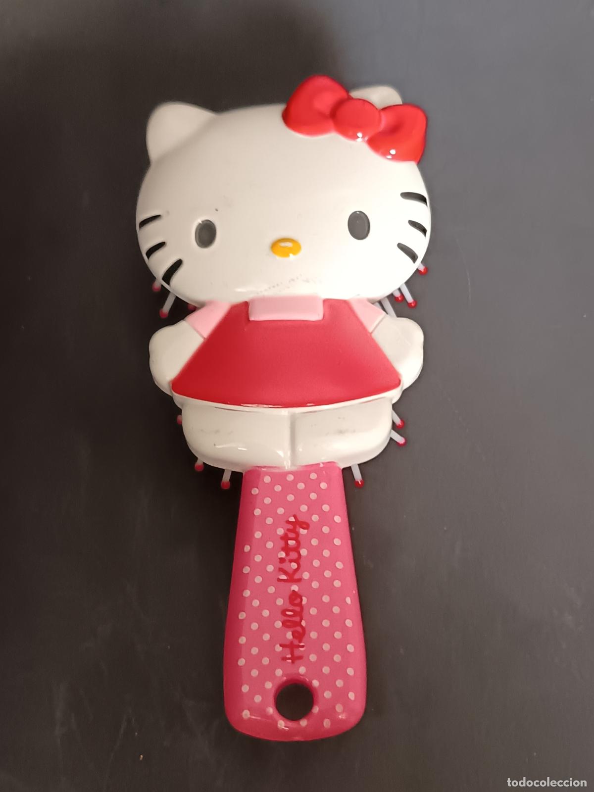 Mu&ntilde;ecas modernas: HELLO KITTY. Peine 14cm.