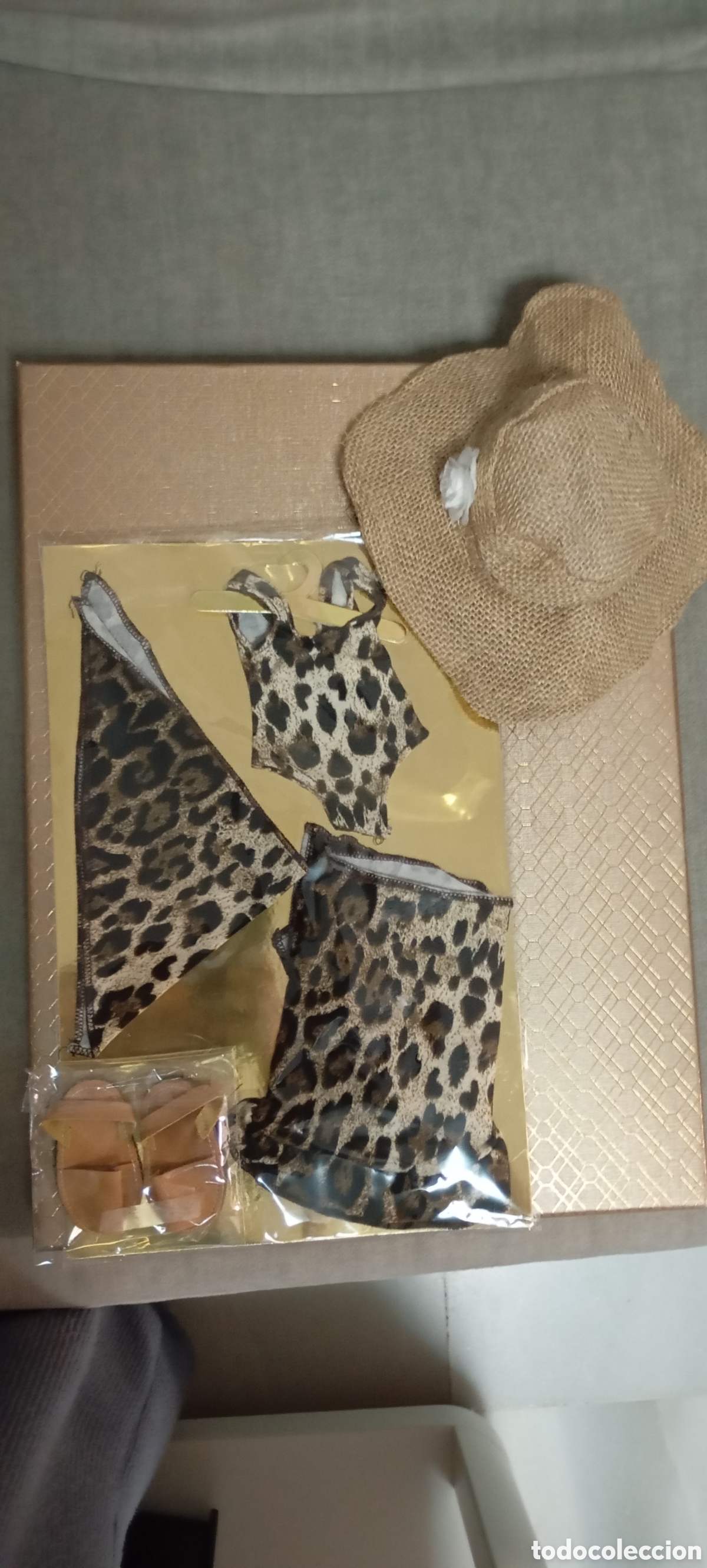 Mu&ntilde;ecas Nancy y Lucas: Nancy conjunto playa animal print