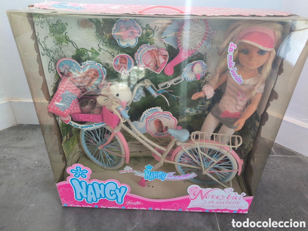 Bonecas Nancy e Lucas: Nancy bici y su cachorro. Un caja.