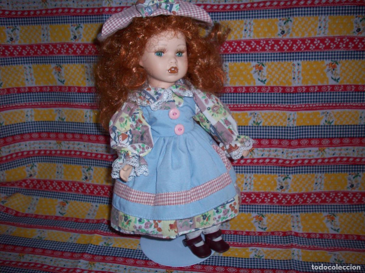 Mu&ntilde;ecas porcelana: mu&ntilde;ea de porcelana pelirroja