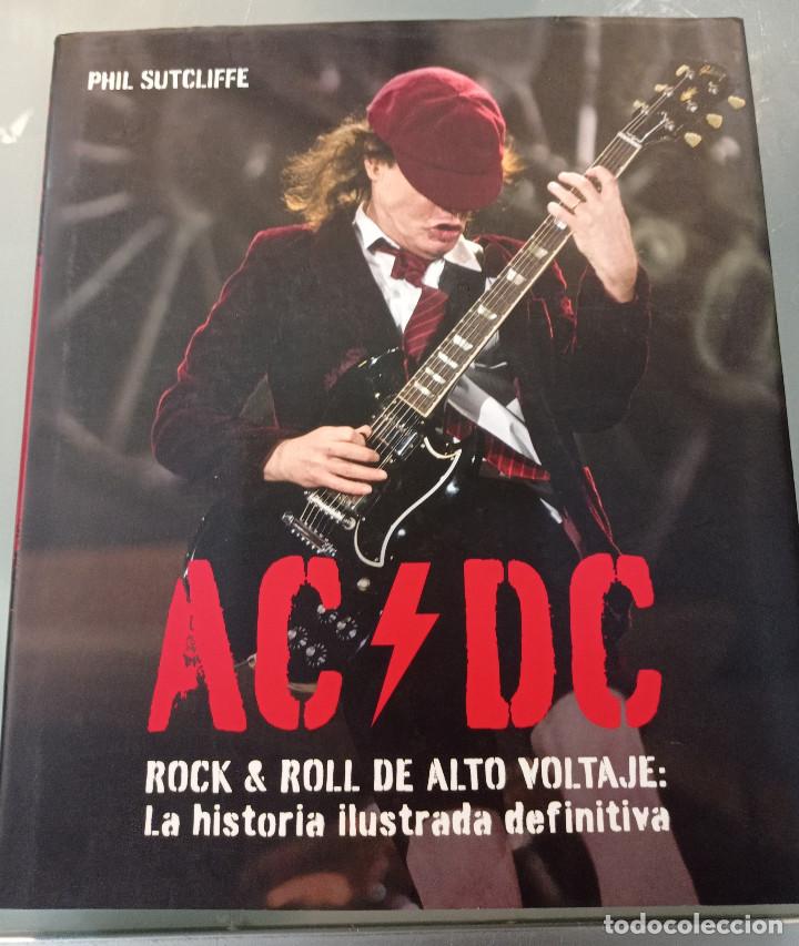 Cataloghi di Musica: AC/DC. ROCK & ROLL DE ALTO VOLTAJE. LA HISTORIA ILUSTRADA DEFINITIVA. PHIL SUTCLIFFE. GRIJALBO,2010.