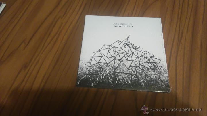 Music CDs: AND FINALLY. HEARTBREAK EMPIRE. CD PROMOCIONAL  EN CART&Oacute;N CON 10 TEMAS. PRECINTADO