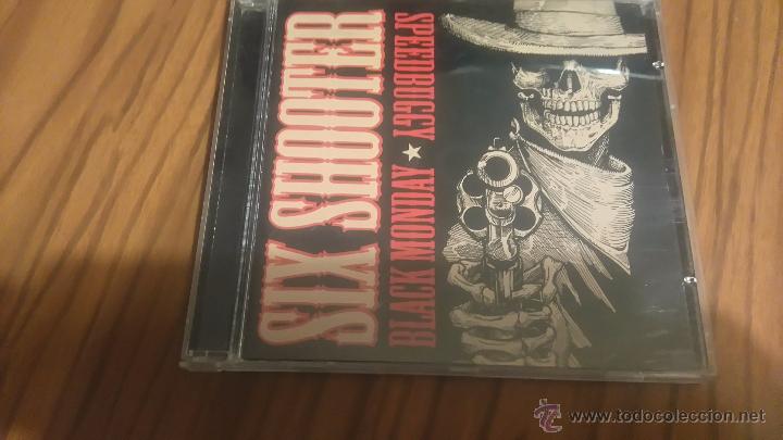CDs de m&uacute;sica: SIX SHOOTER.BLACK MONDAY. SPEEDBUGGY. CD EN CAJA GRANDE EN BUEN ESTADO.