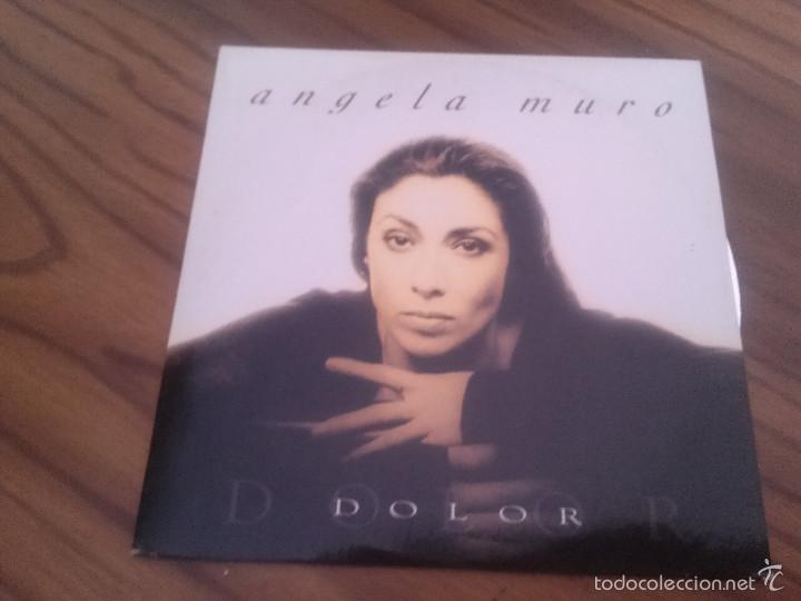 Music CDs: DOLOR. ANGELA MURO. CD PROMOCIONAL EN CART&Oacute;N CON UN TEMA. BUEN ESTADO.