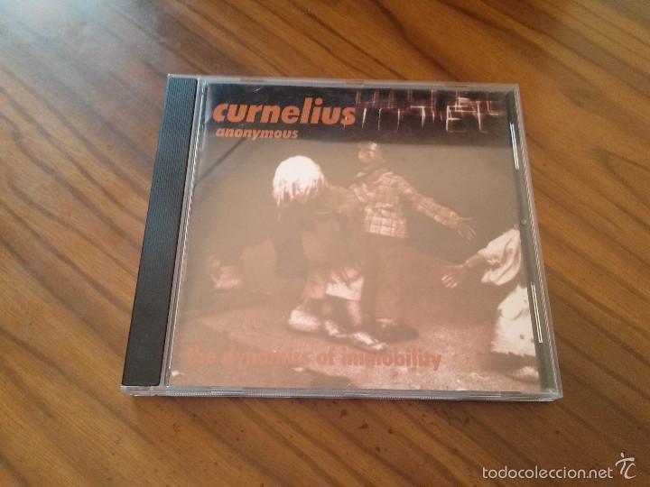 Music CDs: CURNELIUS ANONYMOUS. THE DYNAMICS OF INMMOBILITY. CD CON 11 TEMAS. BUEN ESTADO. RAR&Iacute;SIMO