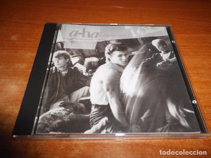 CDs de Musique: AHA Hunting high and low A-HA CD DORADO CD ALBUM DEL A&Ntilde;O 1985 ALEMANIA CONTIENE 10 TEMAS CD ORO GOLD
