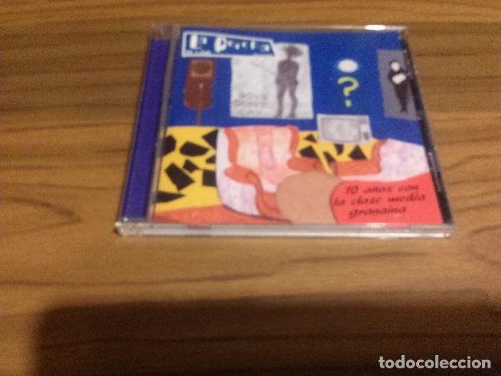 Music CDs: LA PERCHA. 80&acute;S CLUB. 10 A&Ntilde;OS CON LA CLASE MEDIA GRANA&Iacute;NA. CD CON 21 TEMAS. BUEN ESTADO. RARO