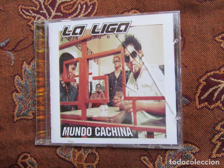 CDs de M&uacute;sica: LA LIGA DEL SUE&Ntilde;O- CD-- TITULO MUNDO CACHINA- CON 15 TEMAS- ORIGINAL DEL 98- POP ROCK- NUEVO