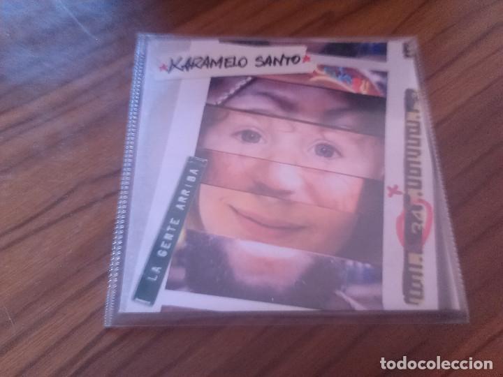 CD de M&uacute;sica: KARAMELO SANTO. LA GENTE ARRIBA. CD PROMO CON 13 TEMAS. BUEN ESTADO. SOLO CAR&Aacute;TULA Y CD. COMO FOTO