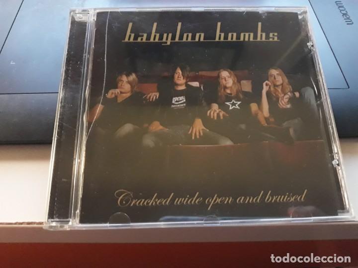 CDs de m&uacute;sica: BABYLON BOMBS - CRACKED WIDE OPEN AND BRUISED CD - Foto 1