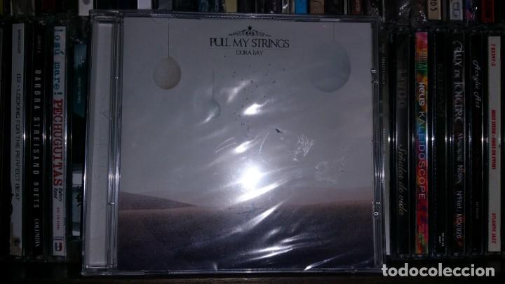 CDs de M&uacute;sica: CD PULL MY STRINGS Dora Bay - PIAS a&ntilde;o 2013 PRECINTADO Excelente &aacute;lbum