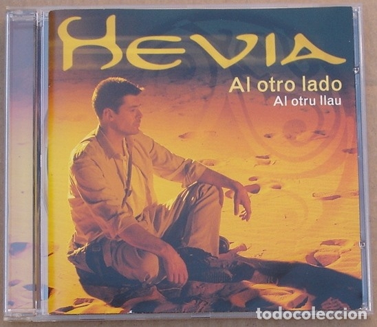 CDs de m&uacute;sica: HEVIA - AL OTRO LADO (CD) 2000 - 11 TEMAS - Foto 1