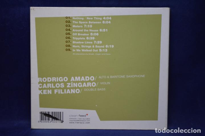 CDs de m&uacute;sica: AMADO, Z&Iacute;NGARO, FILIANO - THE SPACE BETWEEN - CD - Foto 2