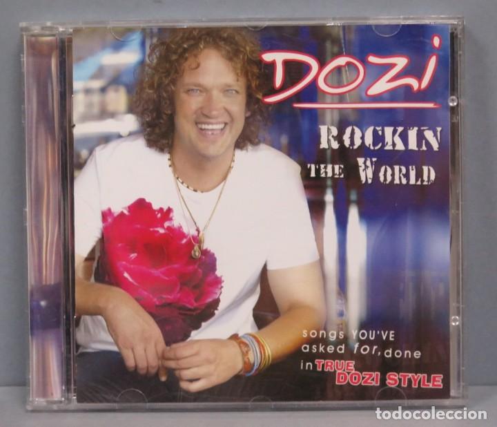 CDs de m&uacute;sica: CD. DOZI. ROCKIN THE WORLD - Foto 1