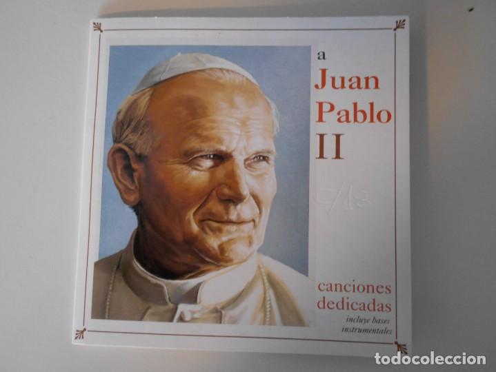 Musik-CDs: A JUAN PABLO II. CANCIONES DEDICADAS. COMPACTO CON 12 TEMAS. ESTUCHE DE CARTON.