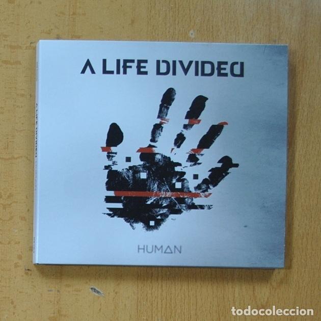 CDs de m&uacute;sica: A LIFE DIVIDED - HUMAN - CD - Foto 1
