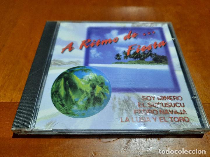 Music CDs: A RITMO DE... FIESTA. CD EN BUEN ESTADO. RECOPILATORIO CON 14 TEMAS. DIFICIL DE CONSEGUIR