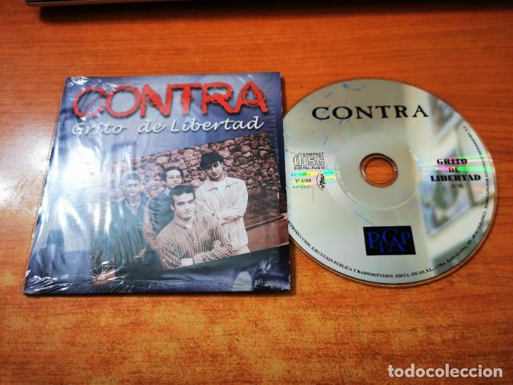 Musik-CDs: CONTRA Grito de libertad CD SINGLE PROMO DEL A&Ntilde;O 2001 PORTADA DE CARTON CONTIENE 1 TEMA
