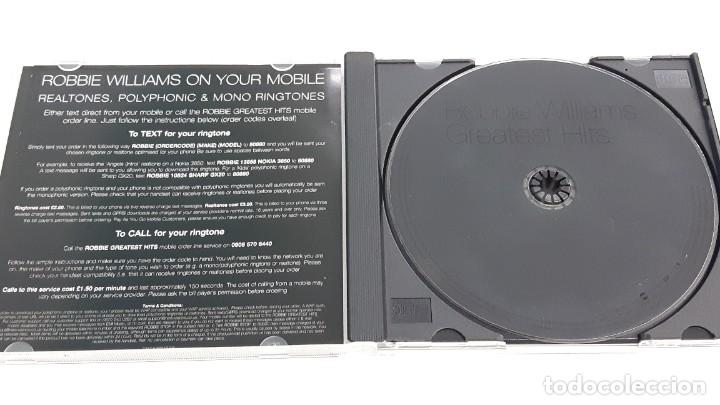 CDs de m&uacute;sica: CD ROBBIE WILLIAMS - GREATEST HITS - Foto 2