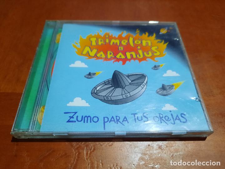 CD de M&uacute;sica: TRIMEL&Oacute;N DE NARANJUS. ZUMO PARA TUS OREJAS. MUCHACHITO BOMBO INFERNO. CD EN BUEN ESTADO